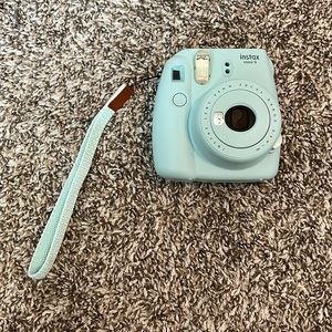 Teal Polaroid camera!